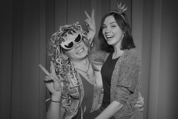 Couple in a glam photo booth.