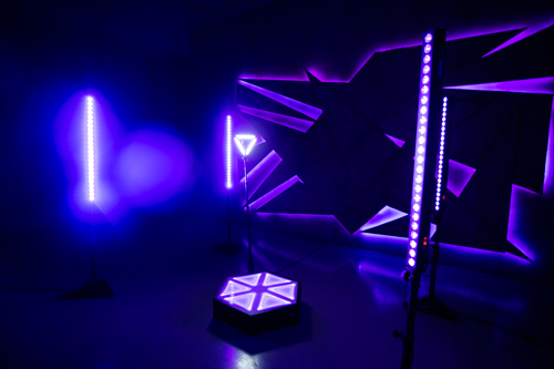 The orbit 360 booth platform glowing under purple LED event lighting