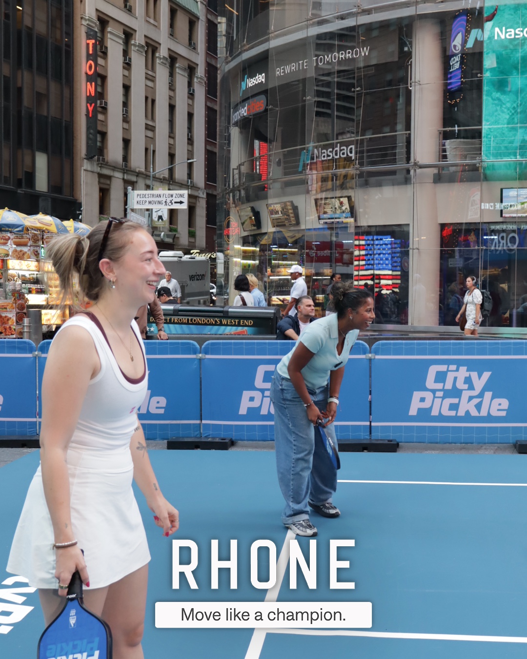 A player reacting mid-game on the City Pickle court, captured with the Rhone branded overlay