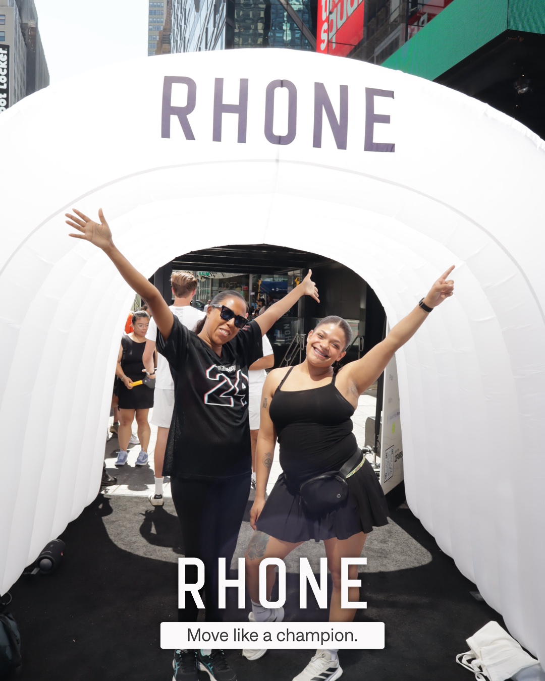 A group celebrating in the branded Rhone tunnel at CityPicklePalooza