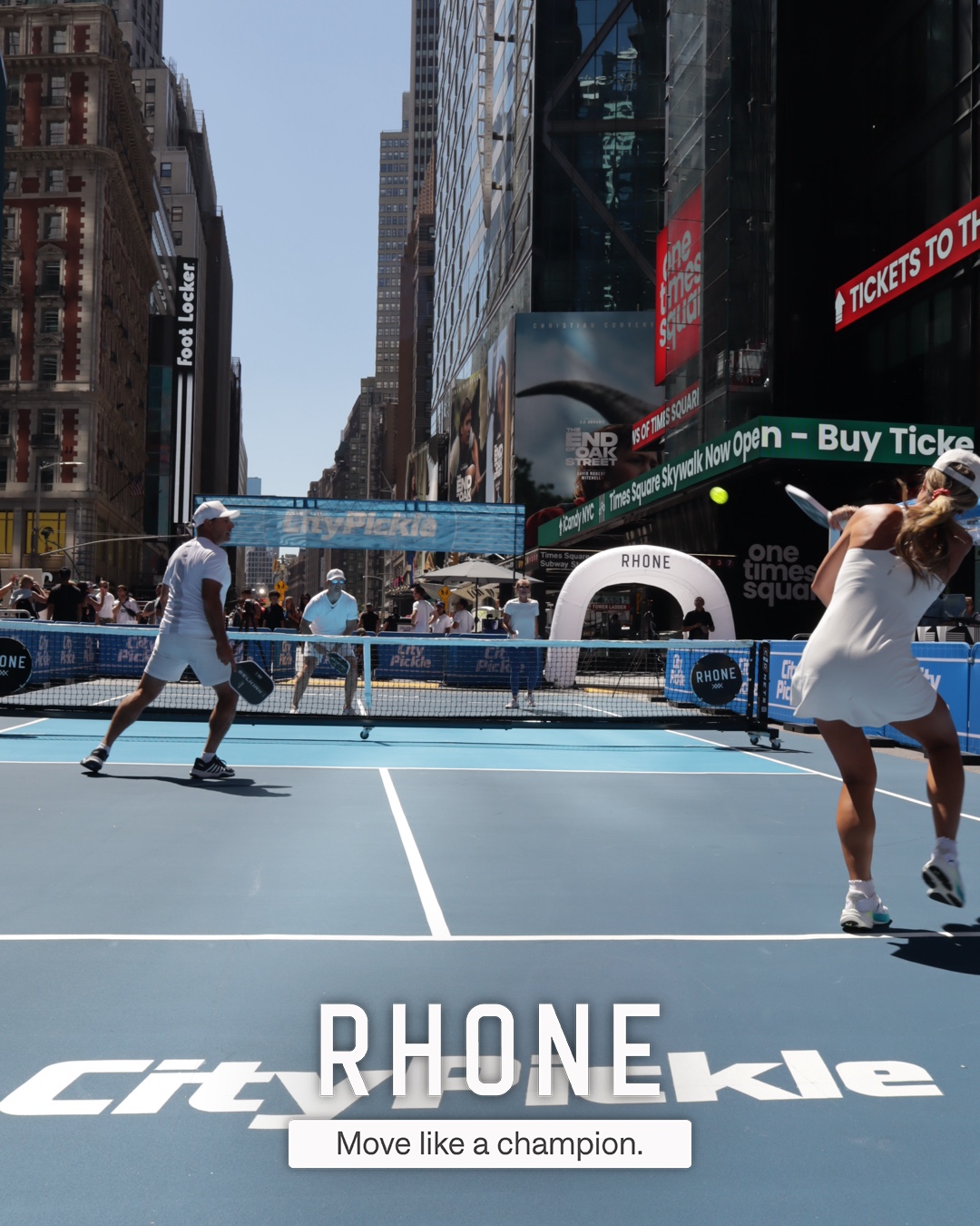 Players rallying on the City Pickle court at the Rhone Times Square activation