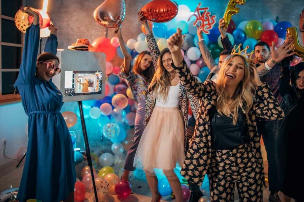 A photo booth at a birthday party.
