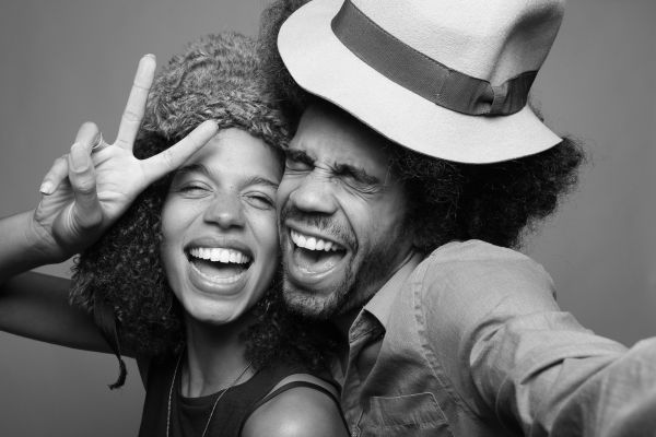 Happy couple in a photo booth 