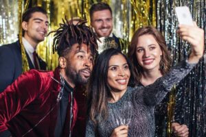 People smiling while using virtual photobooth