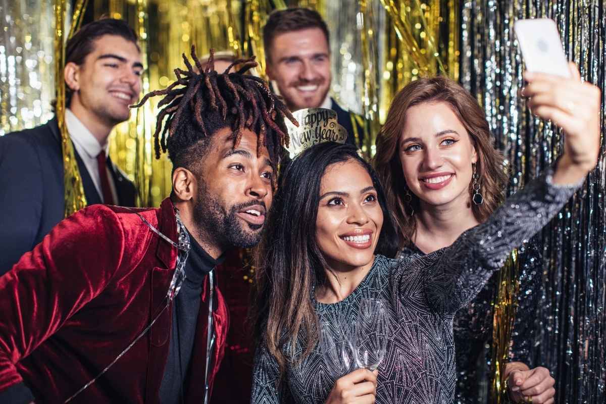 People smiling while using virtual photobooth